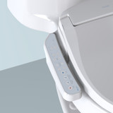 Brondell Swash CL510 bidet toilet seat nozzle with side arm control in front of blue and gray background