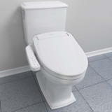 Brondell Swash SE400 bidet toilet seat side arm control installed in a bathroom